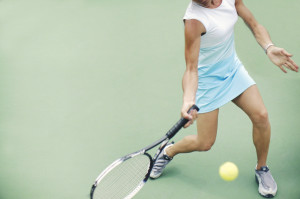 Woman Returning Tennis Volley