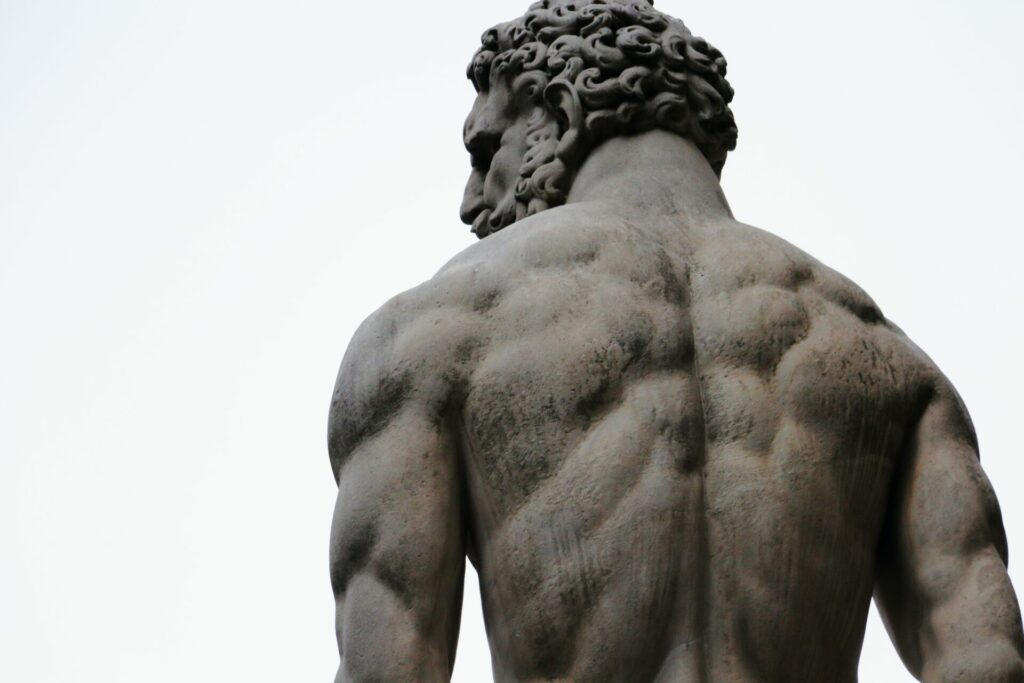 Backside of greek statue, a muscular man with Askēsis