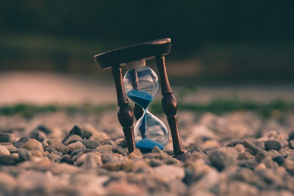 An hourglass, representing the mindset that doesn't waste precious time